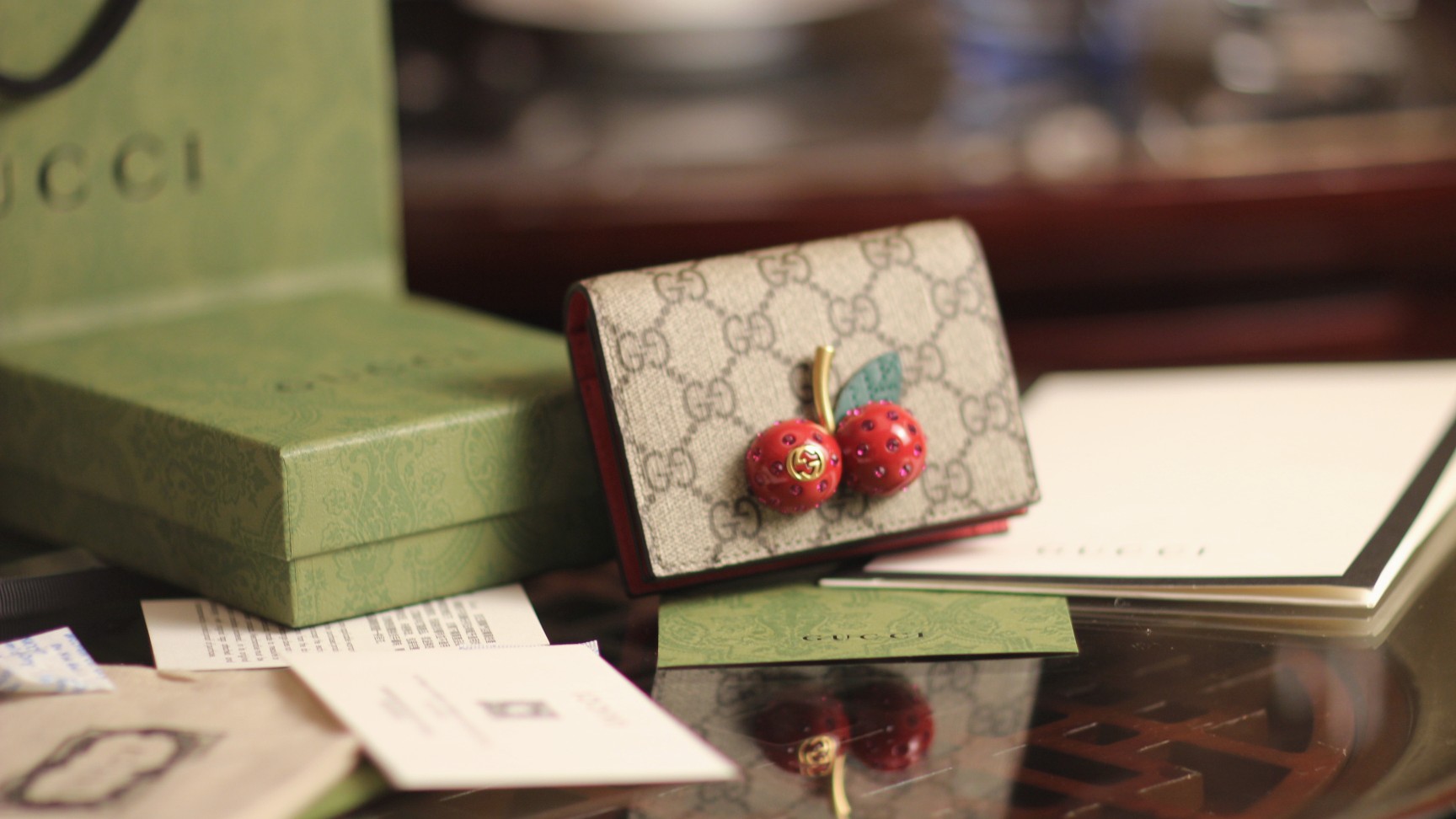 G*u*i cherry wallet