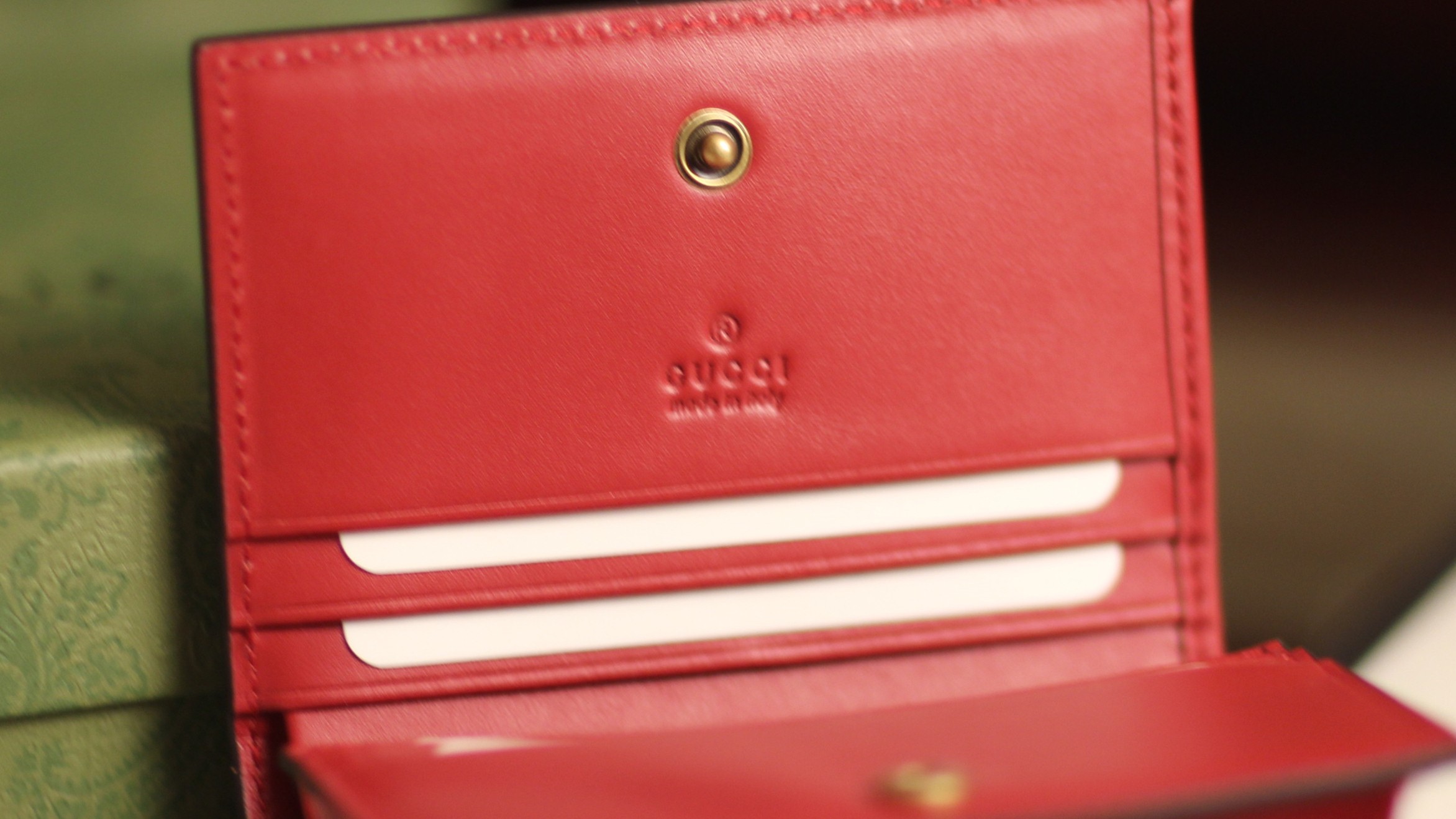 G*u*i cherry wallet