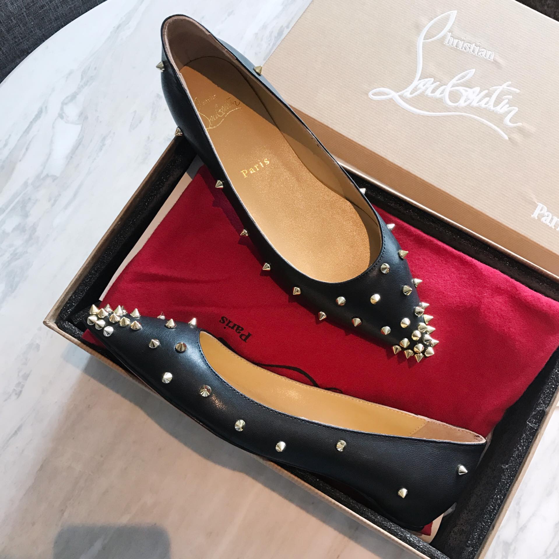 Ch**an louboutin flip spikes flats