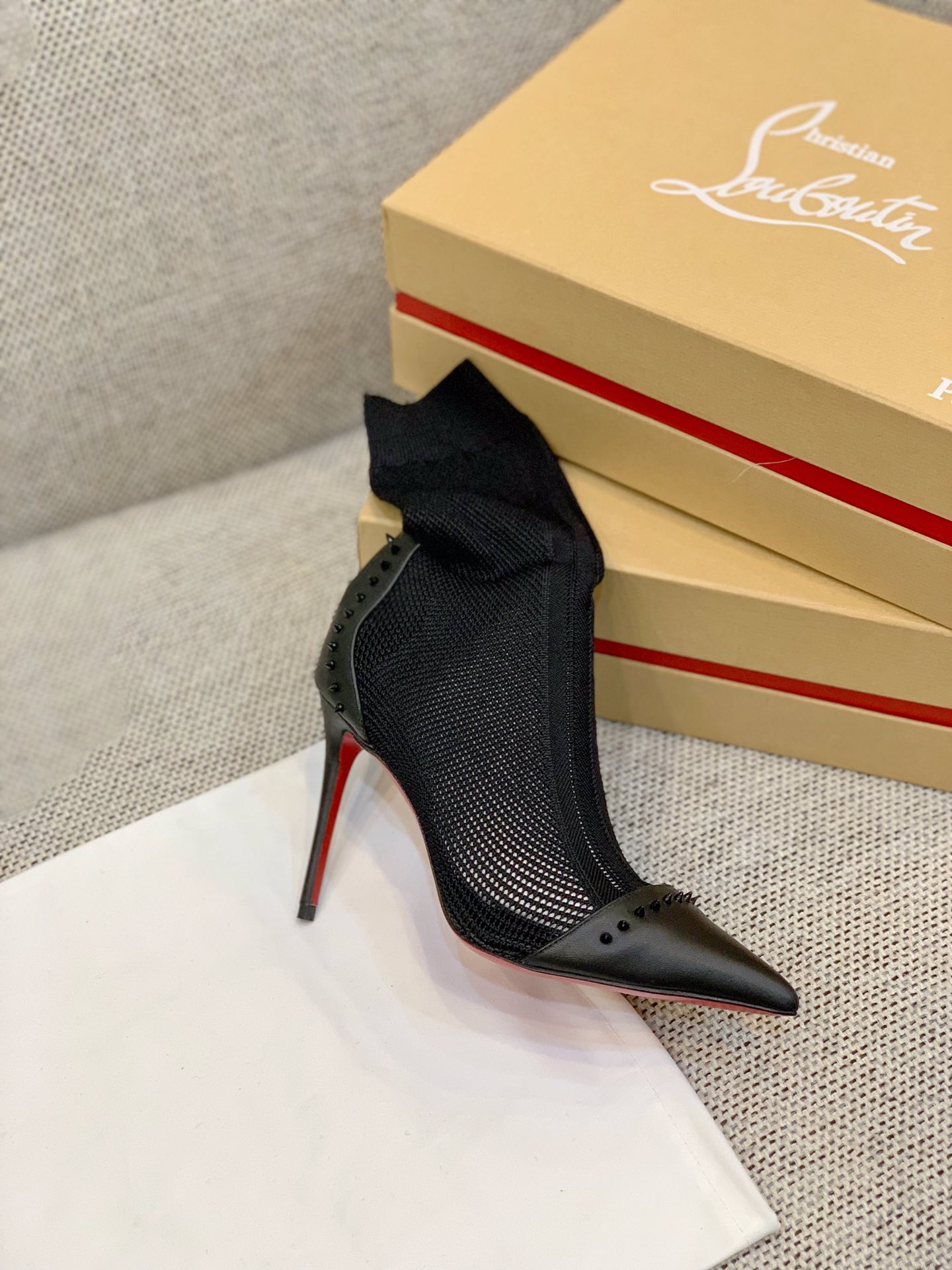 Ch**an louboutin flip spikes ankle boots