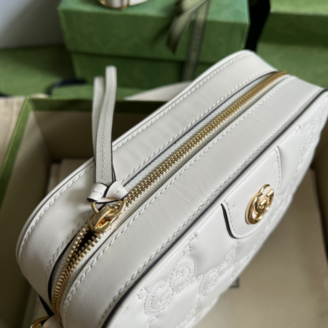 GG Matelassé leather small bag