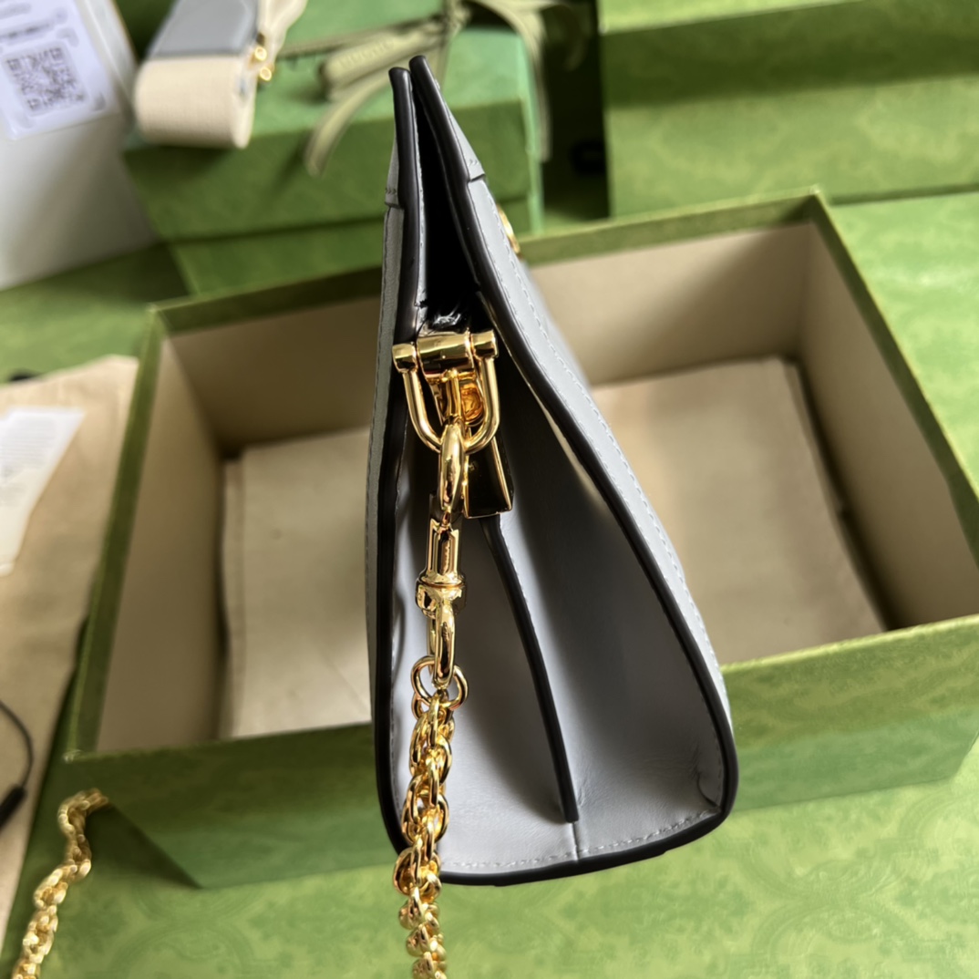GG Matelassé leather small bag