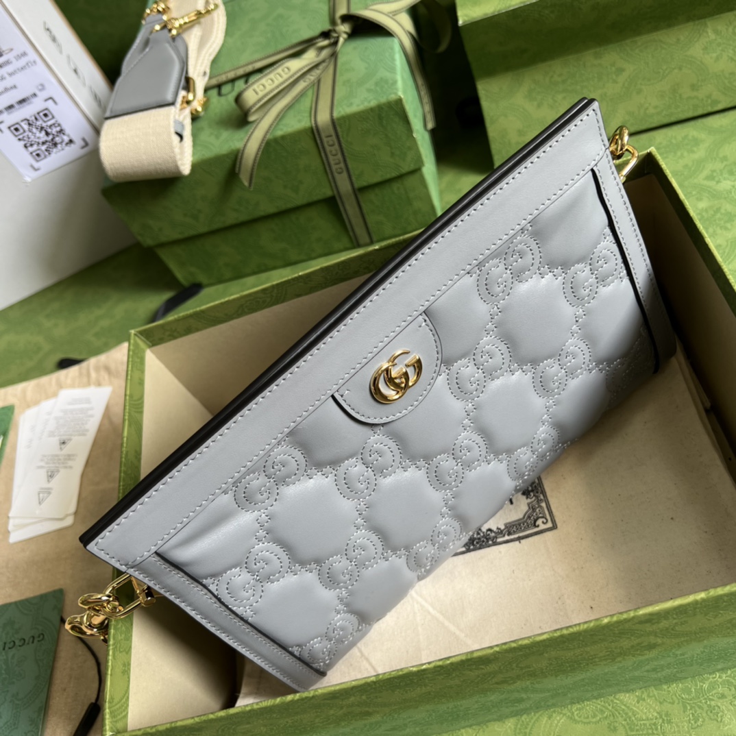 GG Matelassé leather small bag