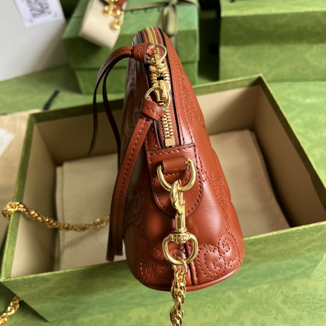 GG Matelassé leather small bag