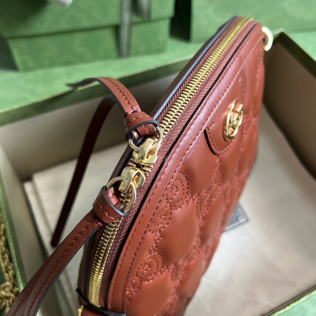 GG Matelassé leather small bag