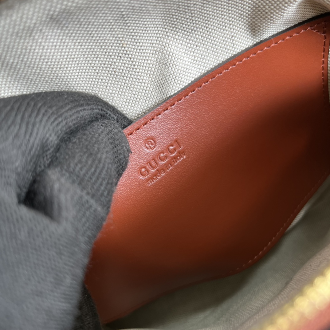 GG Matelassé leather small bag