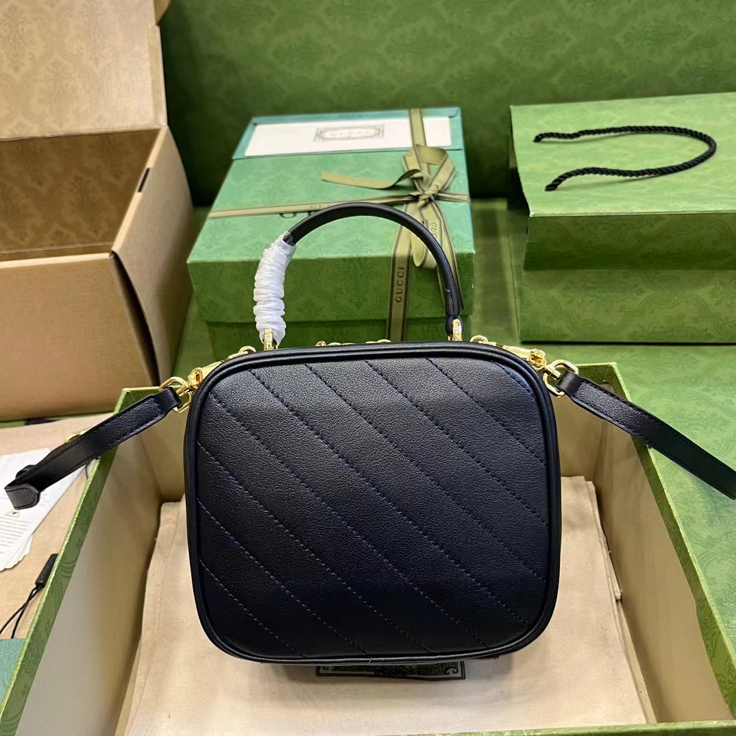 G*u*i soho camera bag