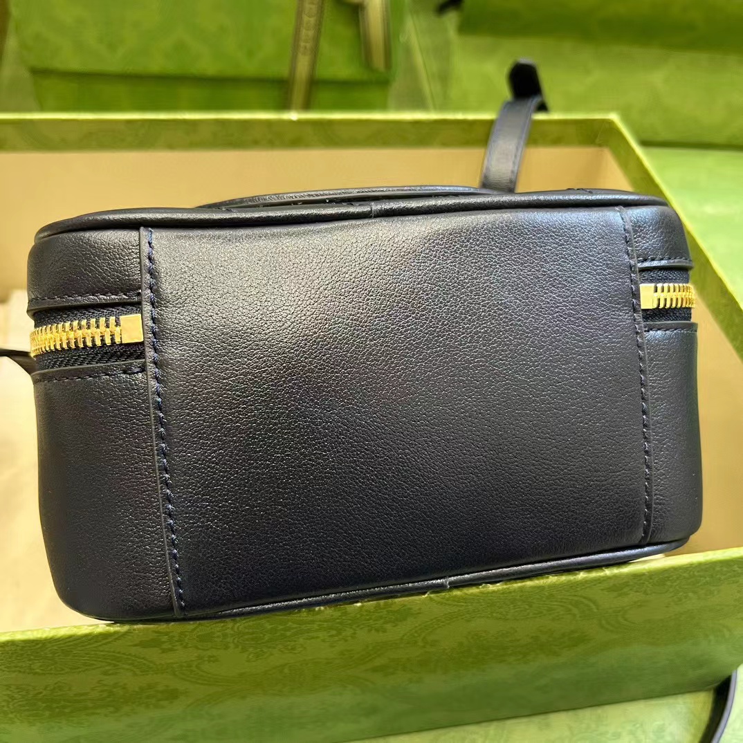 G*u*i soho camera bag