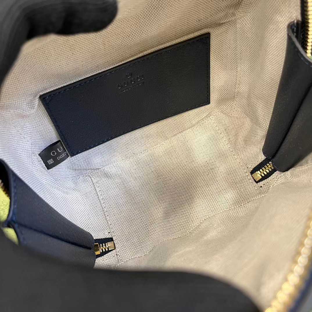G*u*i soho camera bag