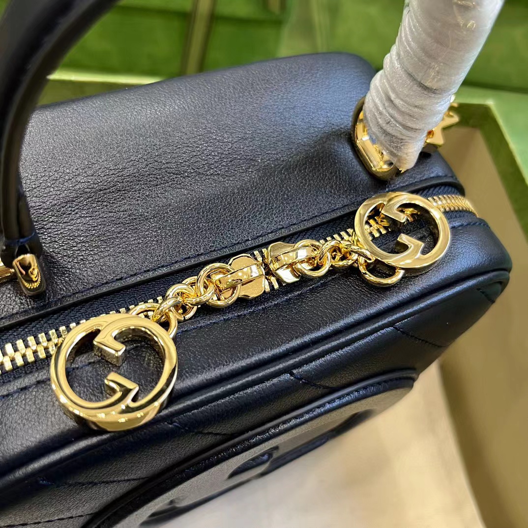 G*u*i soho camera bag