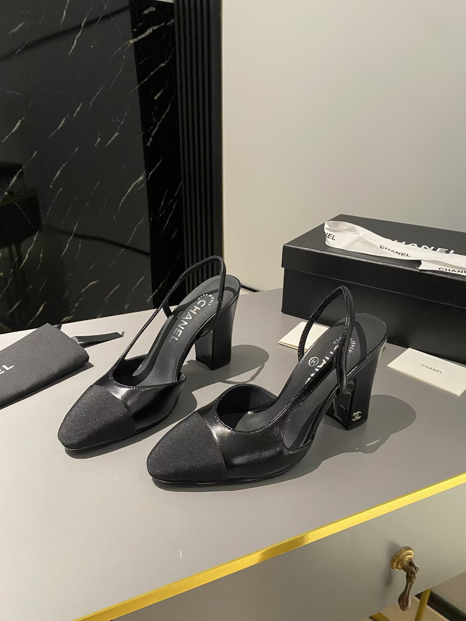 Ch*el lambskin slingback