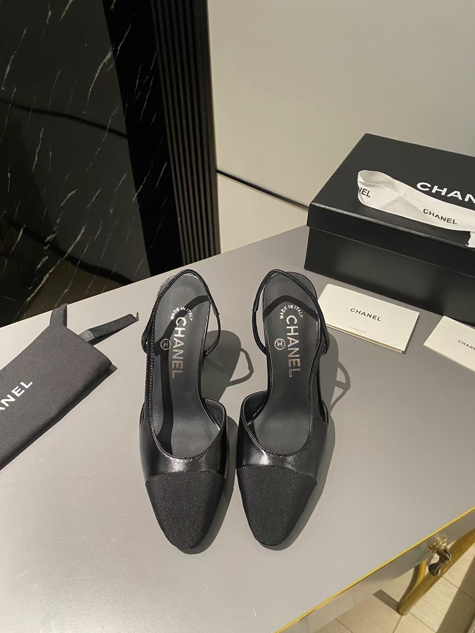 Ch*el lambskin slingback