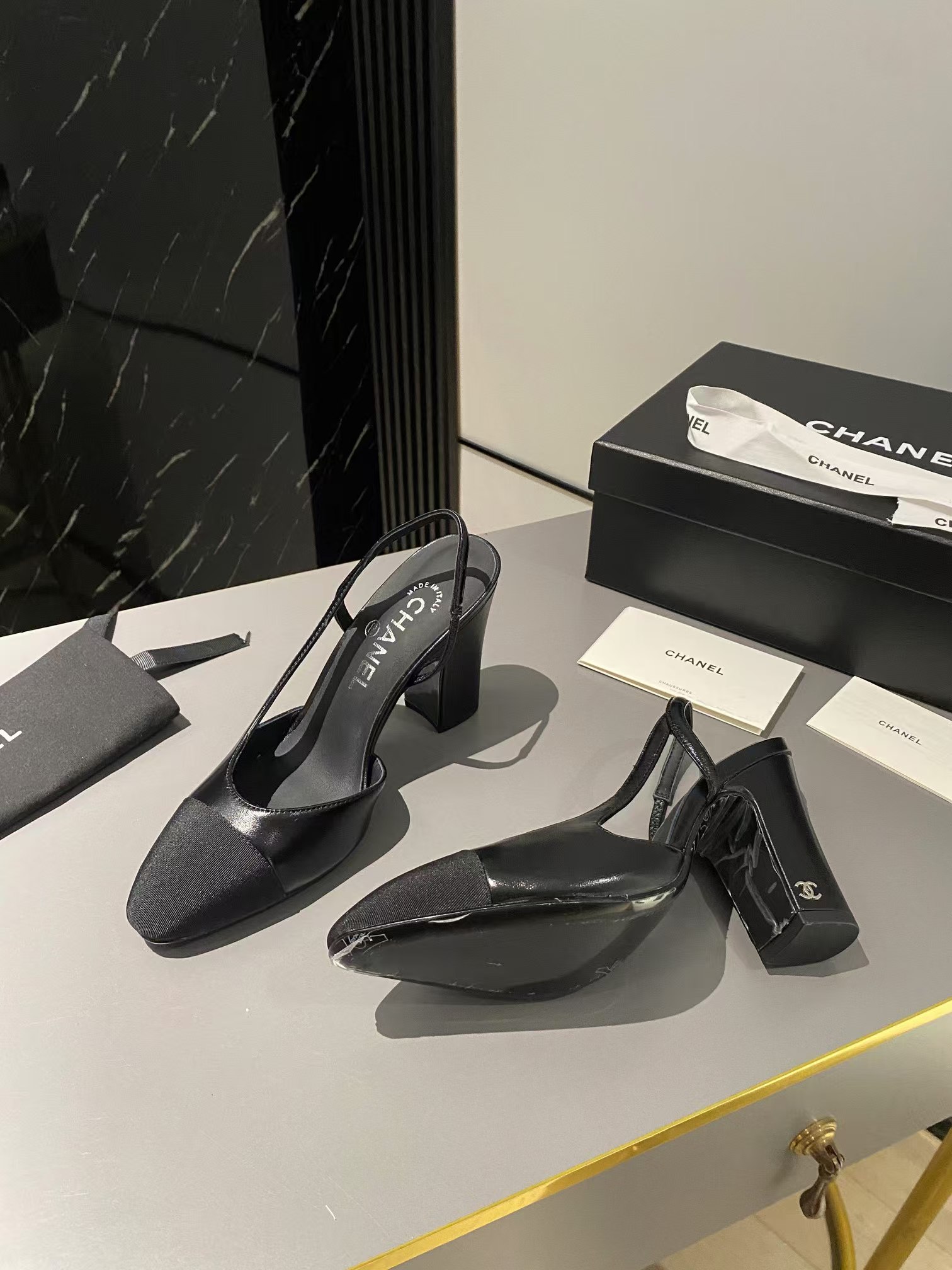 Ch*el lambskin slingback