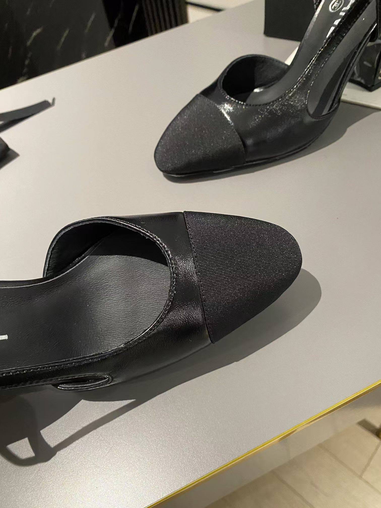 Ch*el lambskin slingback