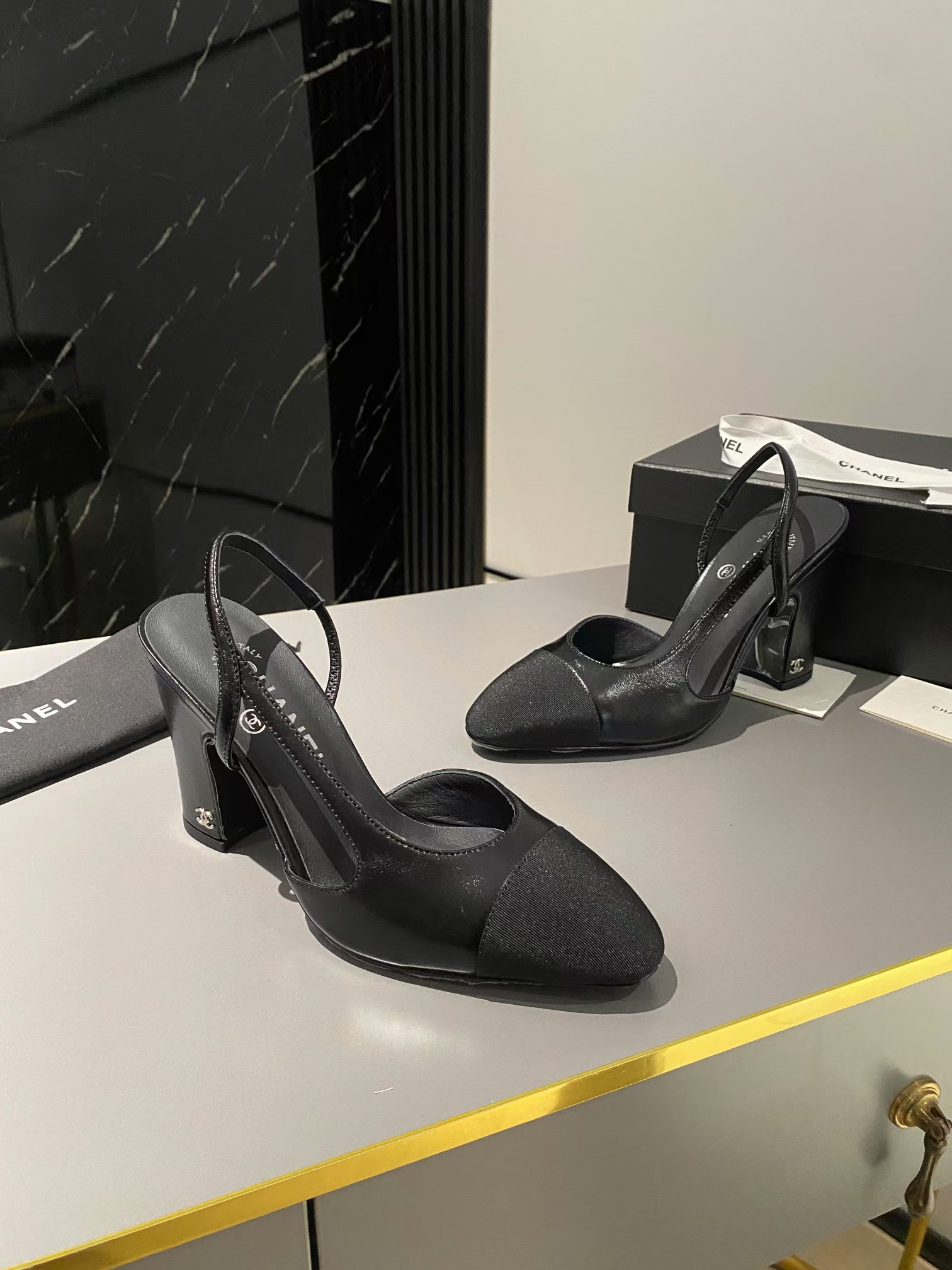 Ch*el lambskin slingback