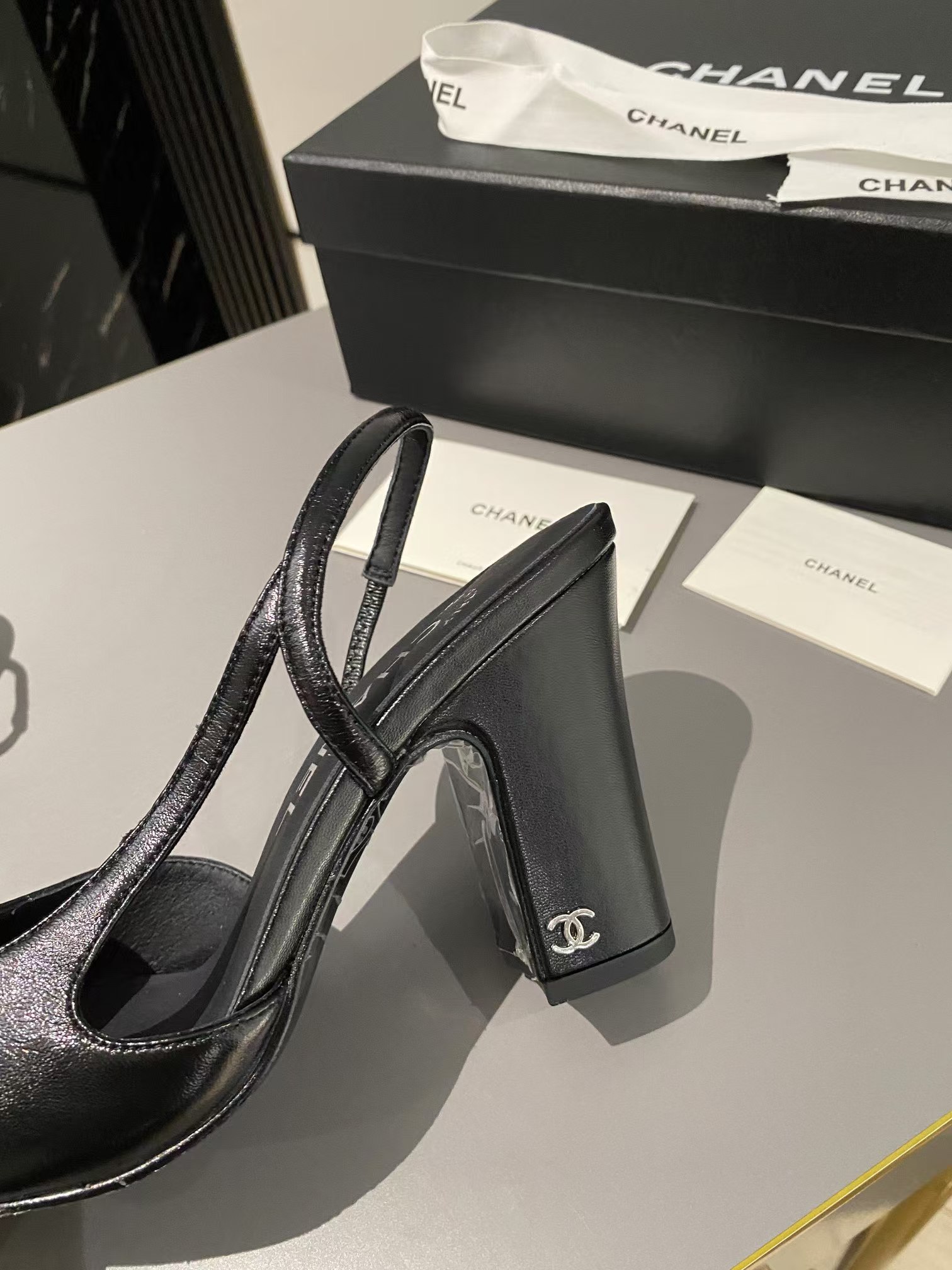 Ch*el lambskin slingback