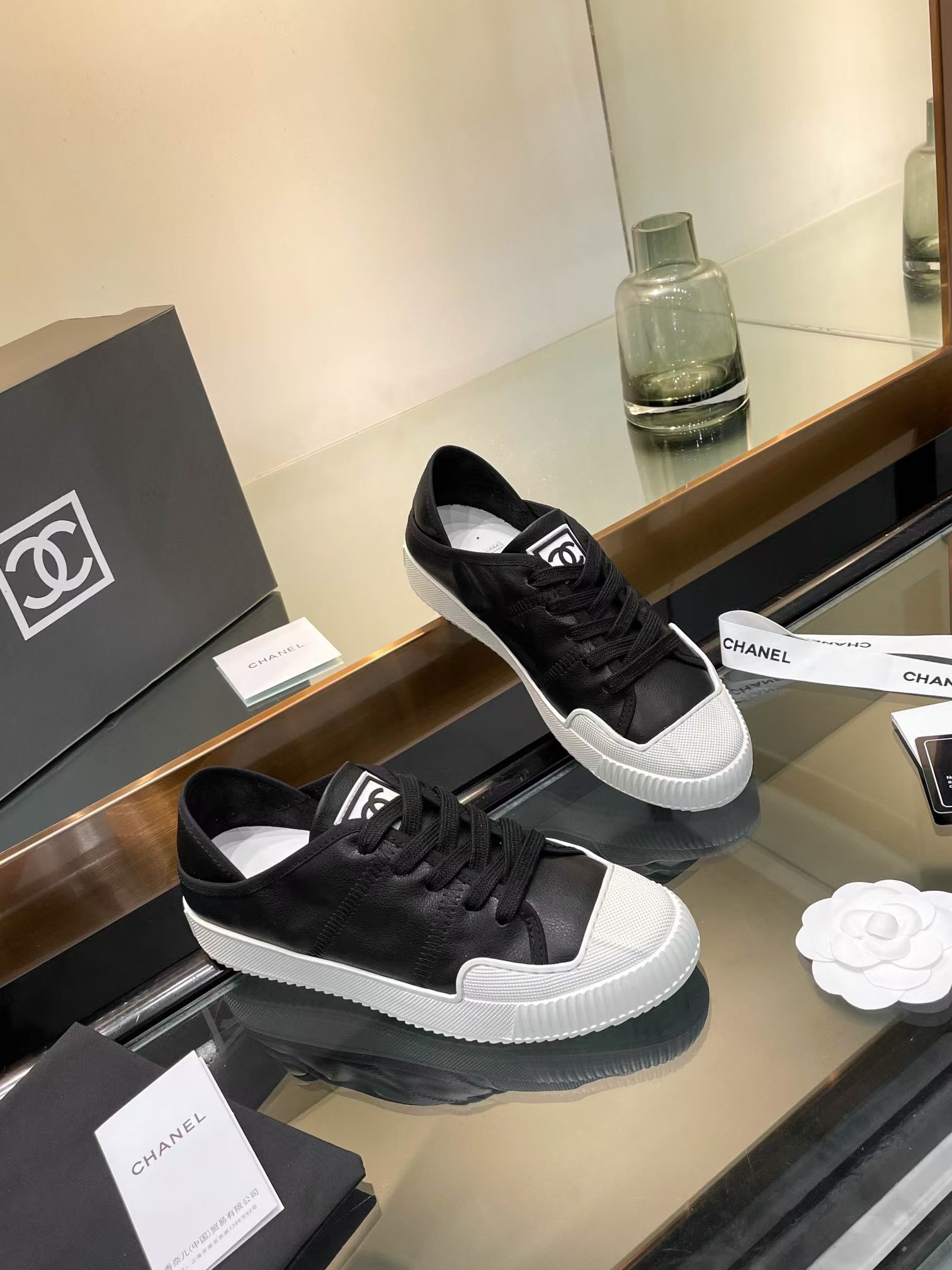 Ch*el casual shoes in black mix white lambskin