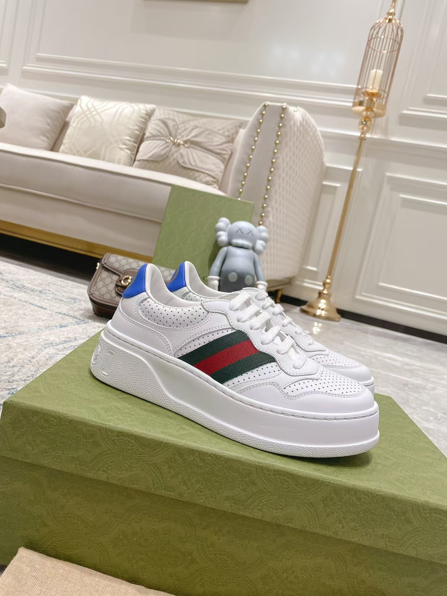 G*u*i leather sneaker with web