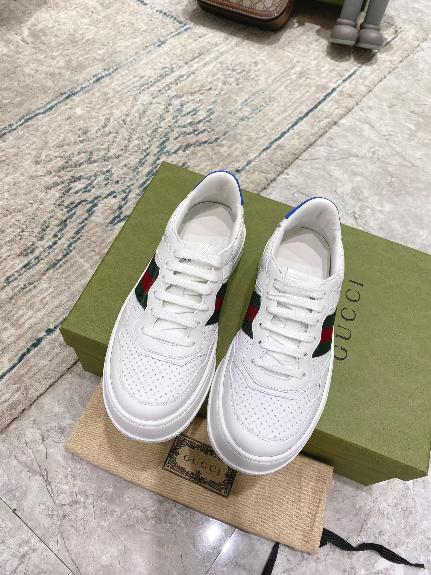 G*u*i leather sneaker with web