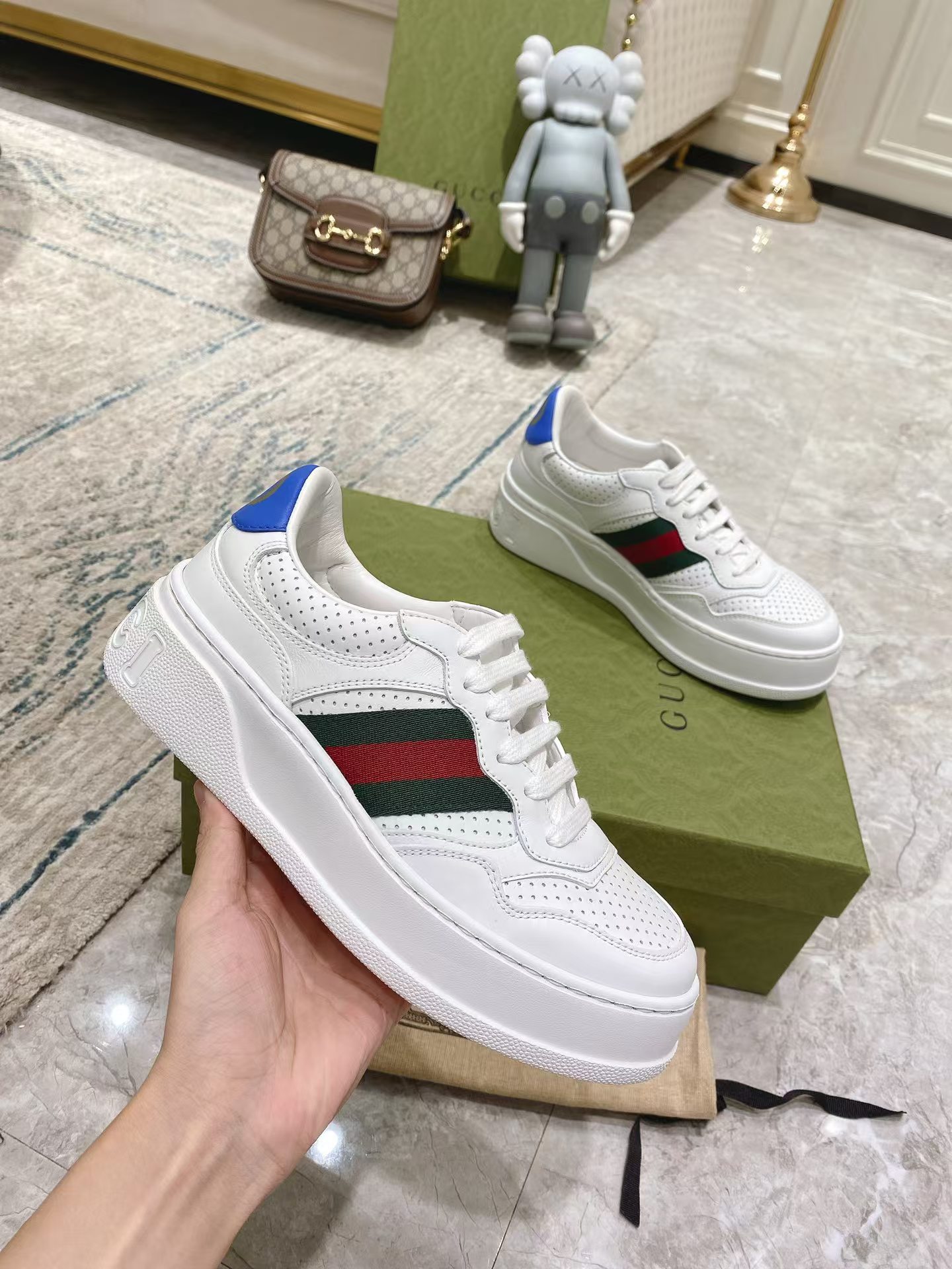 G*u*i leather sneaker with web