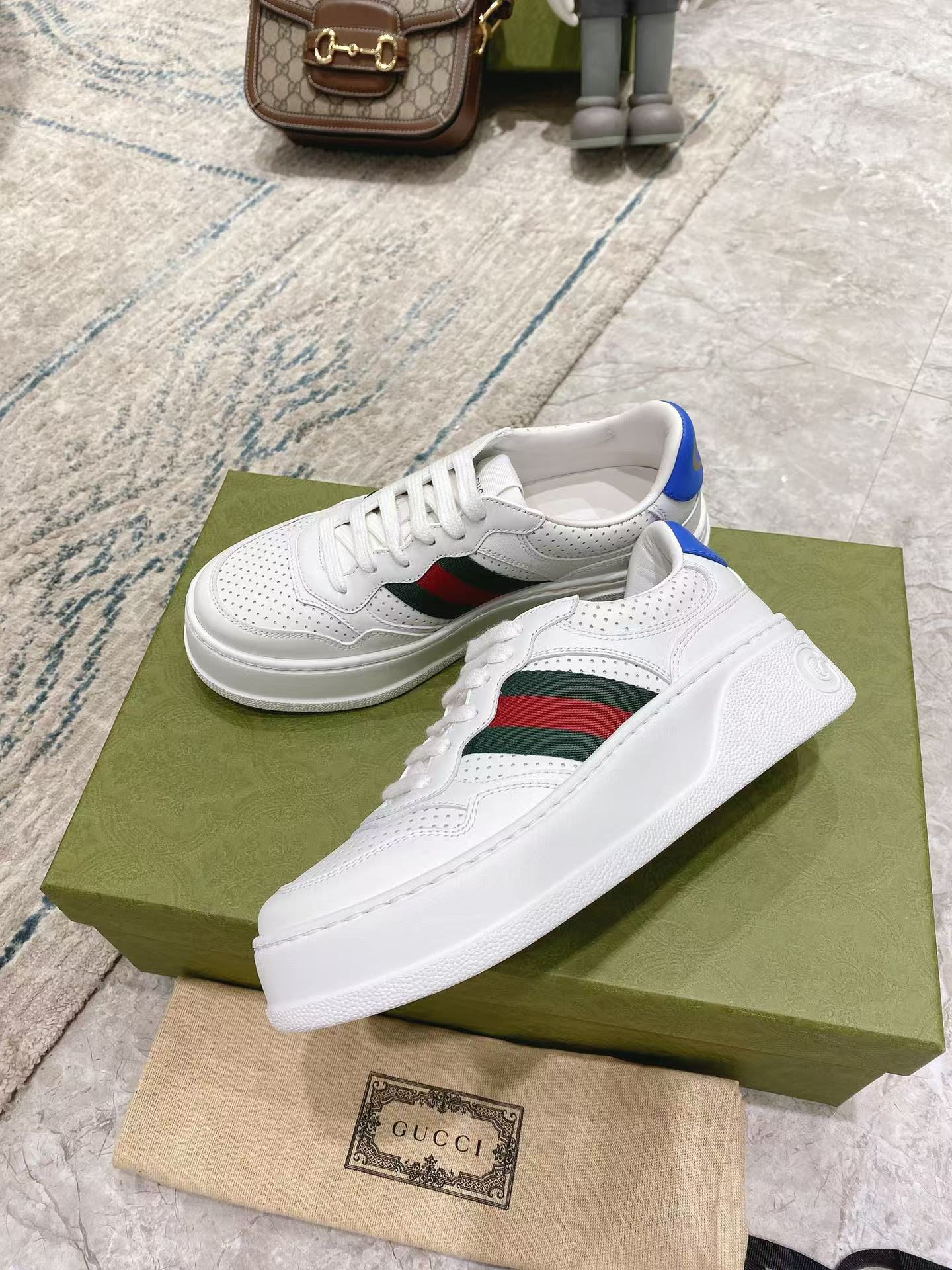 G*u*i leather sneaker with web