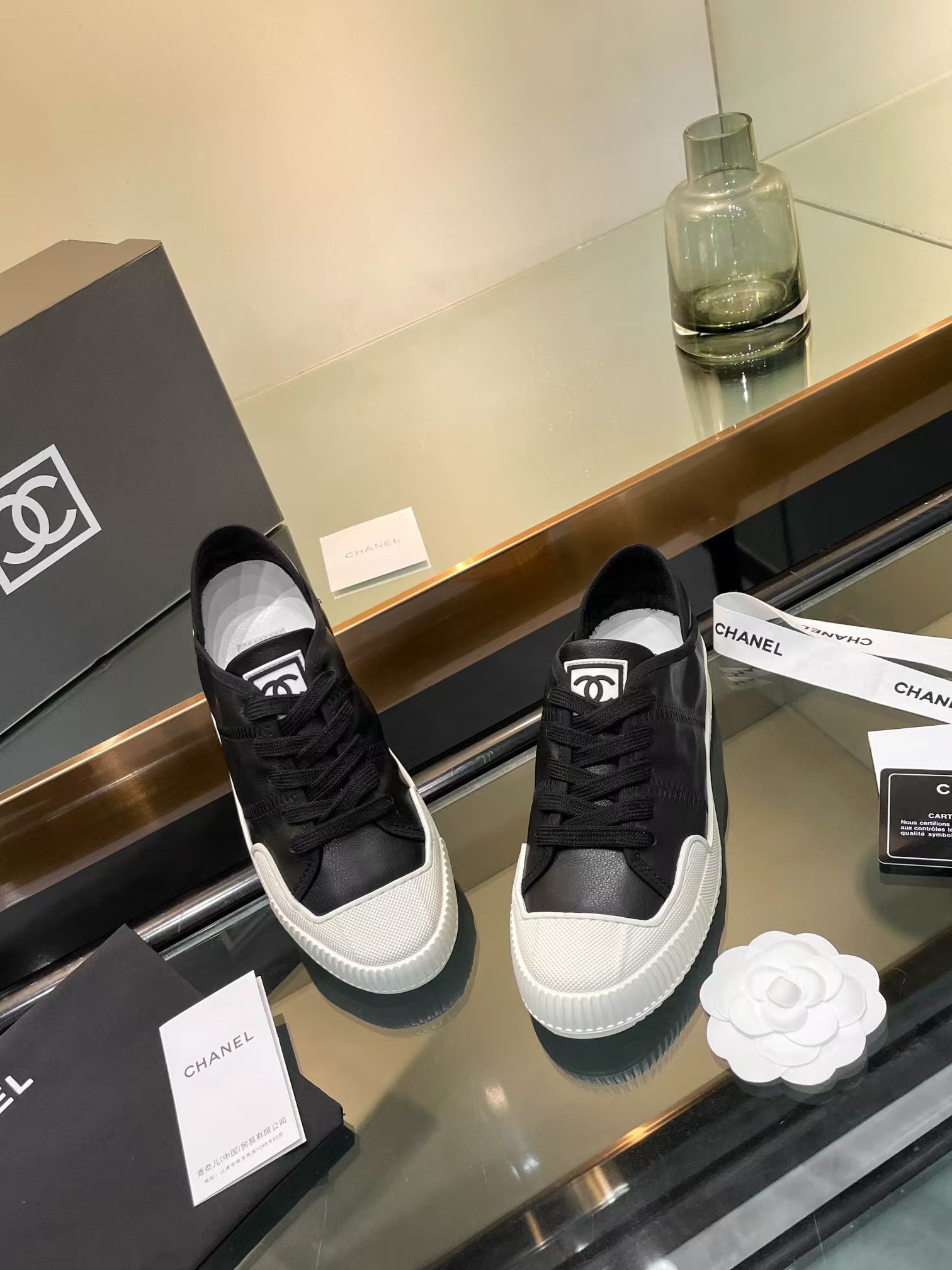 Ch*el casual shoes in black mix white lambskin
